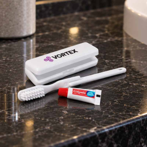 White Travel Toothbrush Set with Colgate Toothpaste