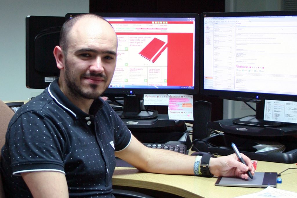 Leight Murcott at his computer