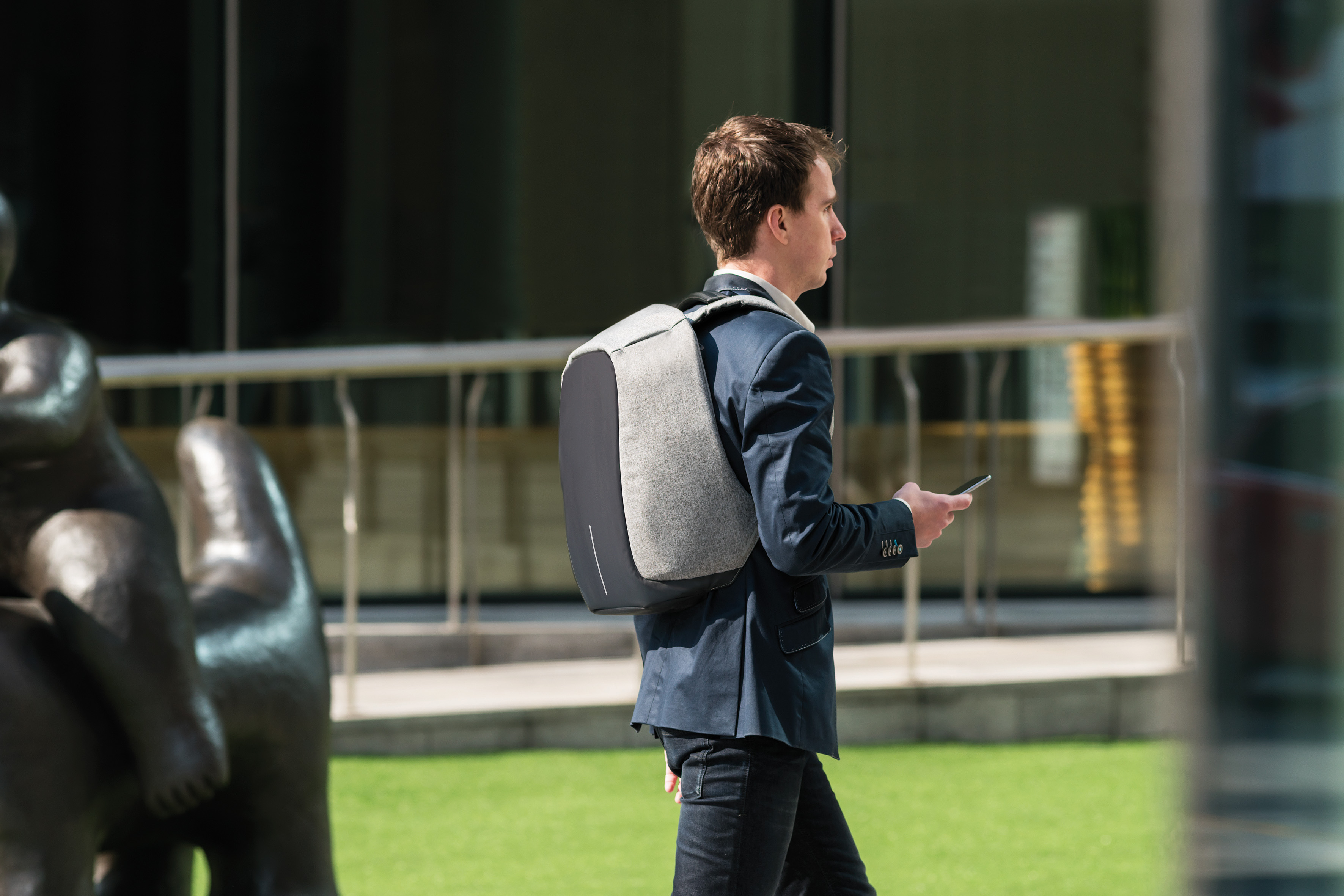 Person walking outside with The Bobby Backpack